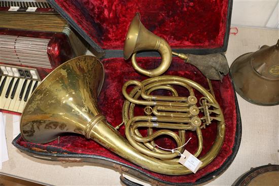 A cased horn, a French horn, a banjo etc (4)